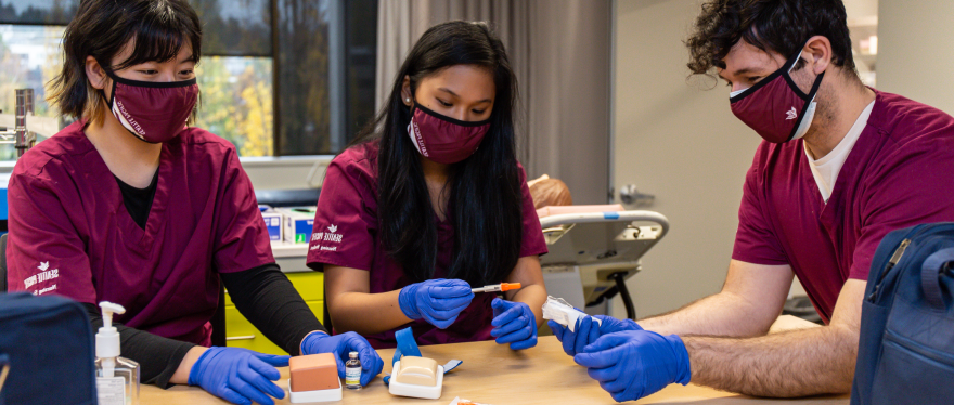 SPU nursing students practice giving insulin injections.